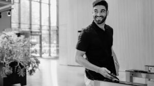 Handsome man using smart phone to enter building access control