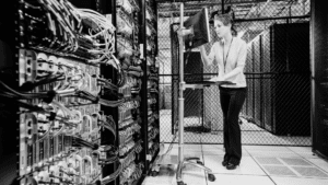 female technician doing diagnostic server tests