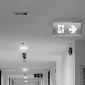 Emergency lighting signs showing way to escape