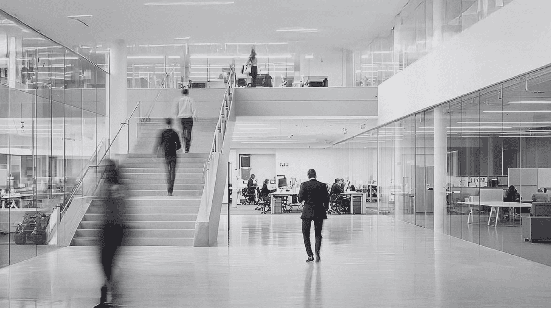 People walking in modern office building
